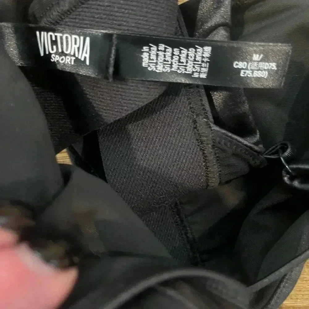 Victoria’s Secret medium black swim top or sports bra modern sleek
